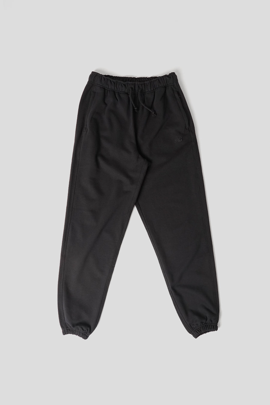 NEW BALANCE - PANTALON DE SURVÊTEMENT ATHLETICS FRENCH TERRY NOIR - LE LABO STORE